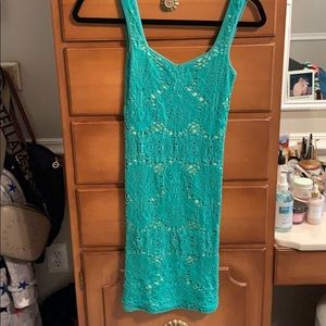 Tight green lace dress